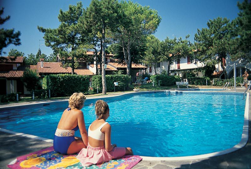 Lignano Pineta villa a schiera con piscina nel verde della pineta vicino al parco Hemingway