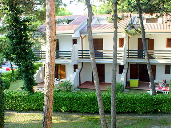 Villa a schiera con giardino privato recinato a Lignano Pineta